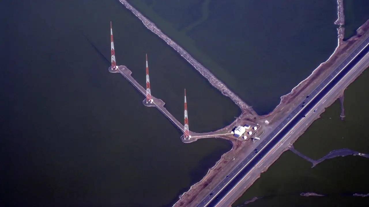 Aerial view of a long causeway crossing open water between the Pinellas and Hillsborough shorelines of Tampa Bay